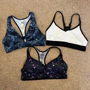 Three Pink sports bras